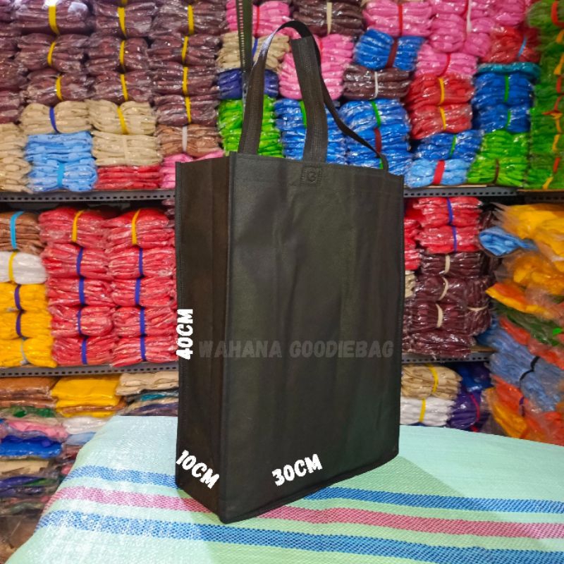 

Tas spunbond bok 30x40x10 /Goodie bag/tas kain polos tebal 75gsm