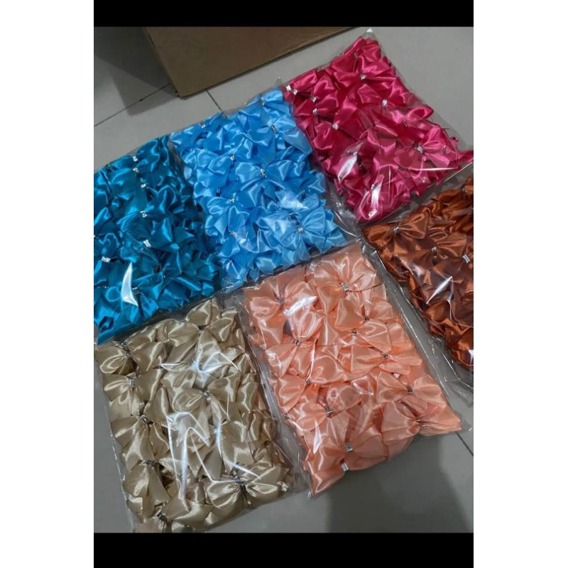 

Pita Souvenir | Hiasan pita | Hiasan Souvenir | Hiasan Hampers | Pita Satin | Hiasan Kado | Pita Kado