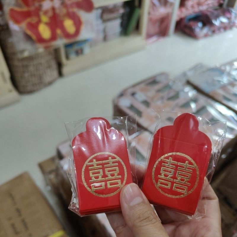 

angpao koin sudut rak lemari