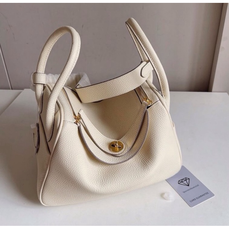 queen of material bag