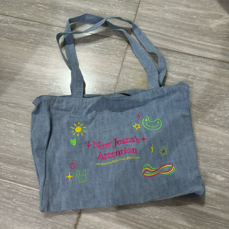 new jeans attention tote bag