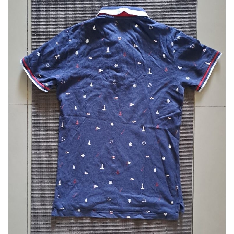 Baju Polo Biru Motif