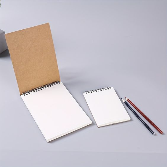 

BUKU SKETSA A7/SOUVENIR/HADIAH/SKETCHBOOK MINI/BRONW PAPER/BOOKPAPER/HVS/SKETSA