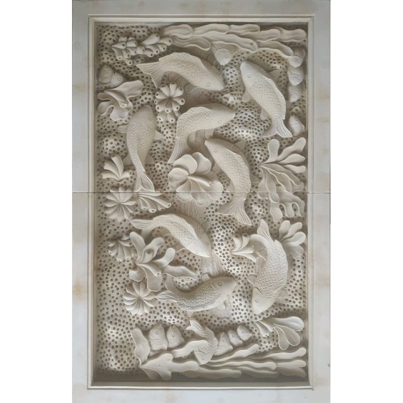 ukiran batu alam motif ikan