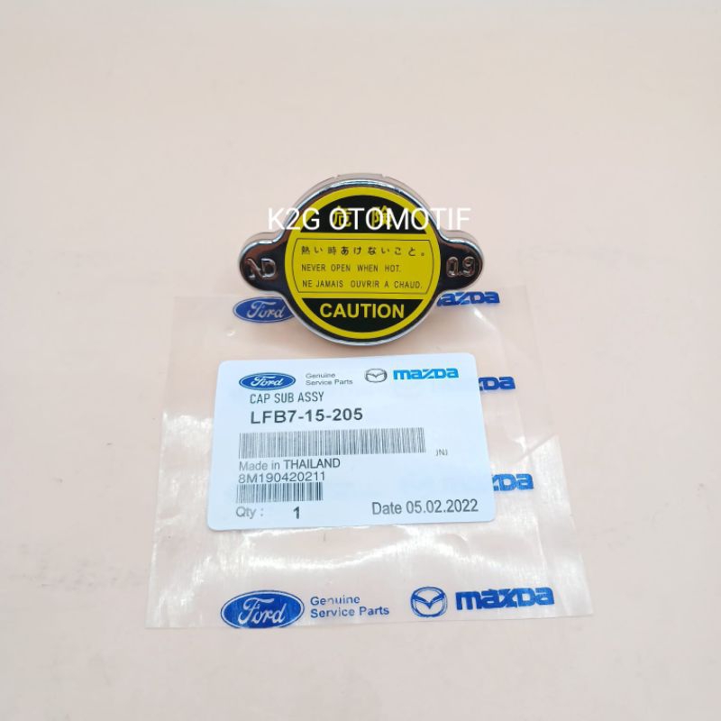 TUTUP RADIATOR MAZDA 2 323 ORIGINAL