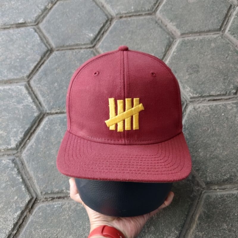 TOPI UNDEFEATED LAWAS SECOND ORIGINAL