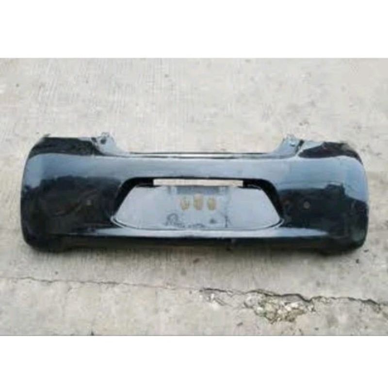 bemper belakang mirage 2012