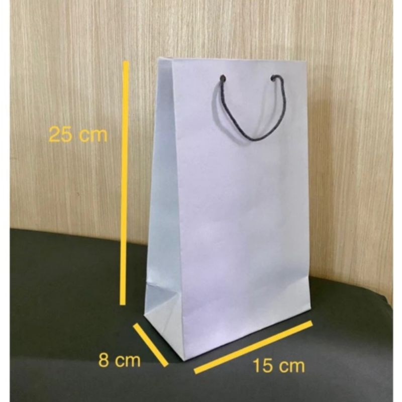 

Paperbag Polos Putih 15x8x25cm Wafer Tas Kertas Kado Souvernir panjang