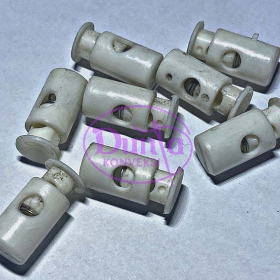 STOPPER UJUNG TALI BULAT PUTIH KUNING /PCS
