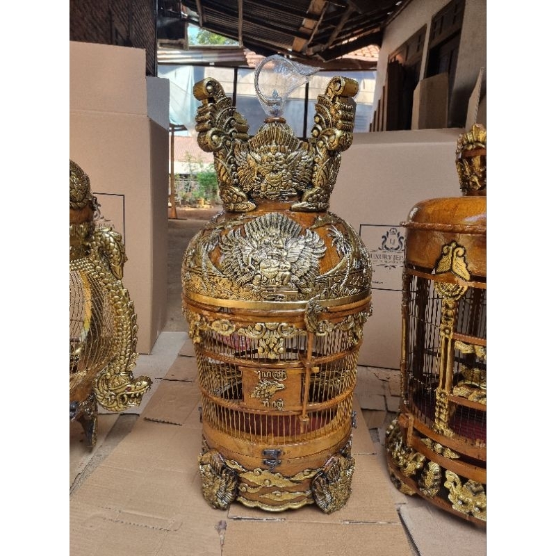 sangkar ukir garuda wisnu relief kayu jati
