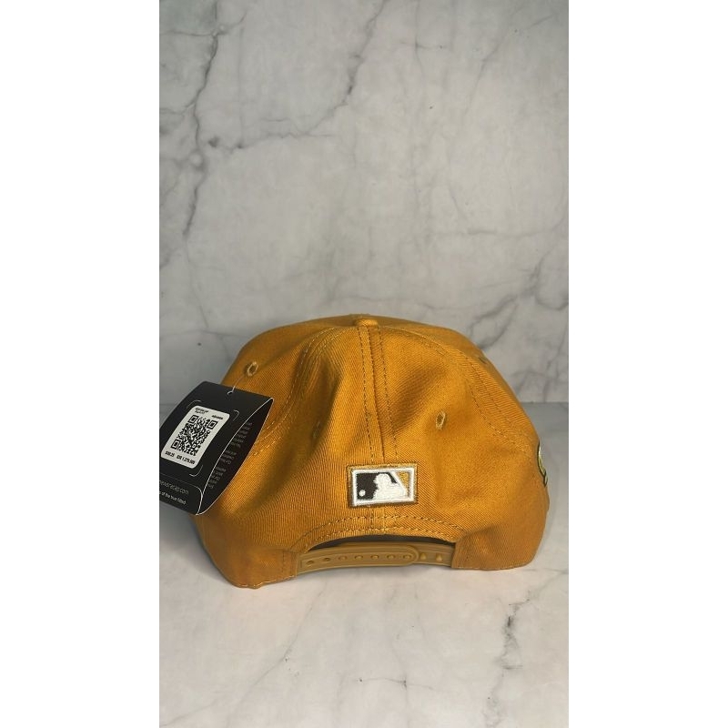 Topi snapback NY kuning