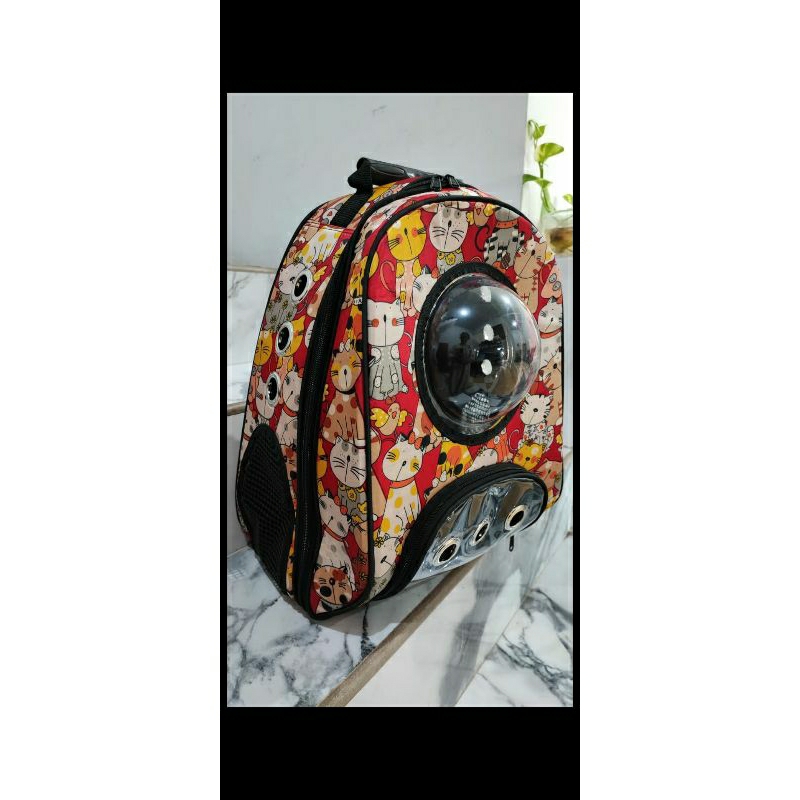 tas kucing astronot motif