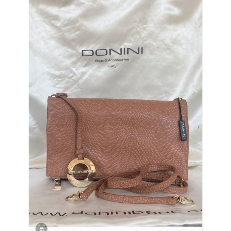 Donini Sling Clutch