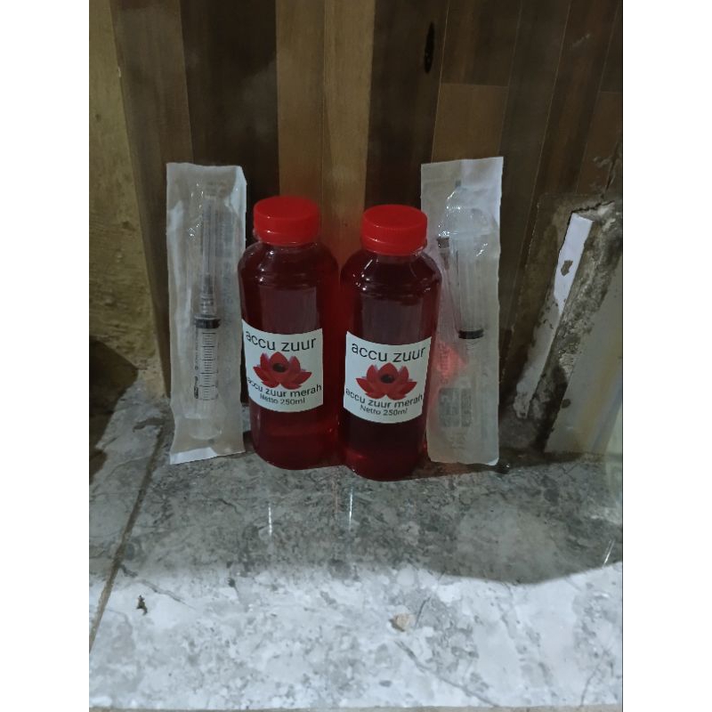 2 botol air aki merah buat aki kering motor yang soak dan lemah