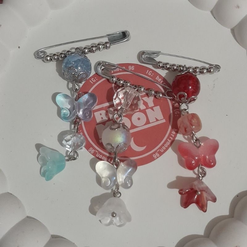 pin manik kaca
