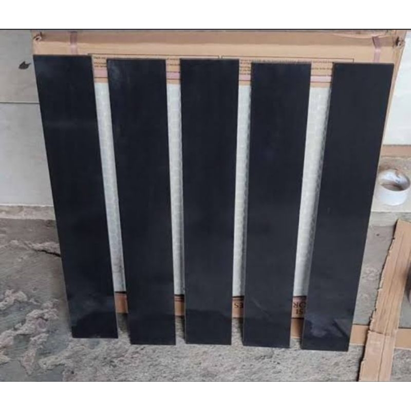 granit plin uk 10x60 hitam polos glosy kia