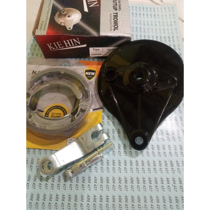 TUTUP TROMOL BELAKANG ASTREA GRAND/PRIMA/SUPRA X/PANEL REM TROMOL BELAKANG SET +KAMPAS REM HONDA SUP