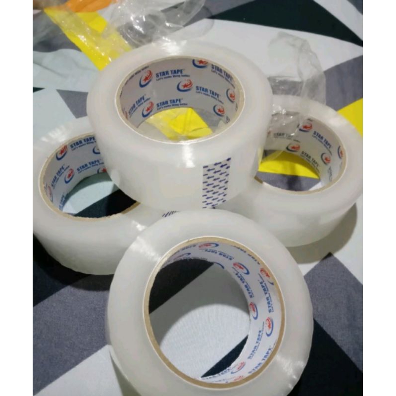 

Lakban Bening (per pcs) 200 yard x 45mm