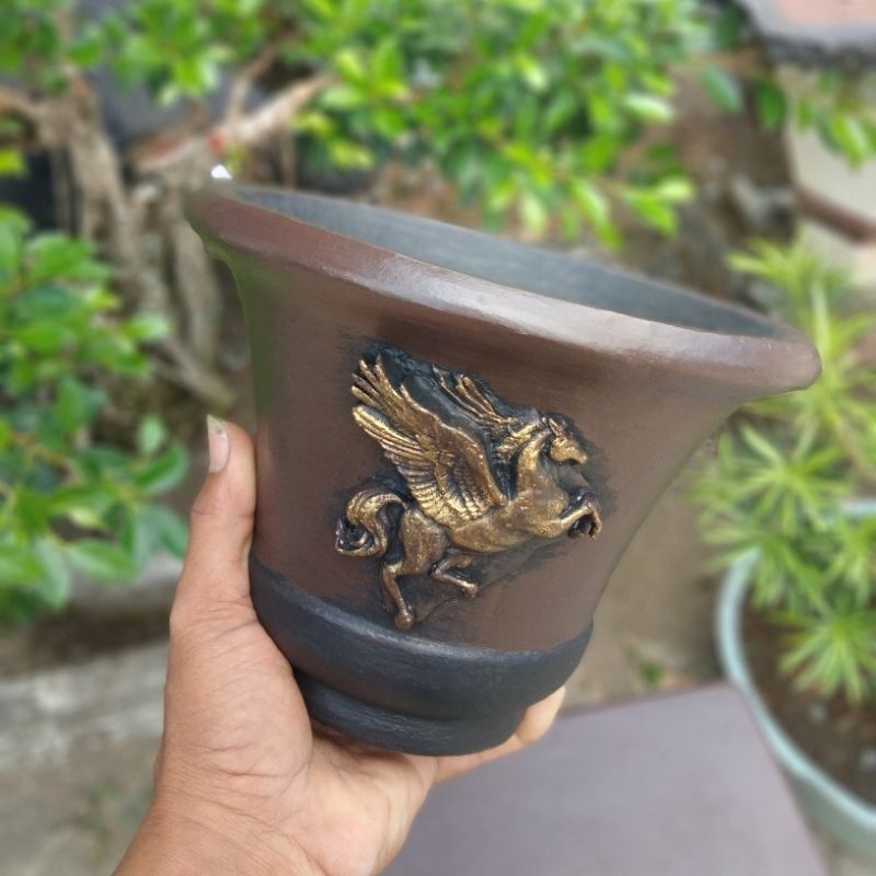Pot small relief unicron