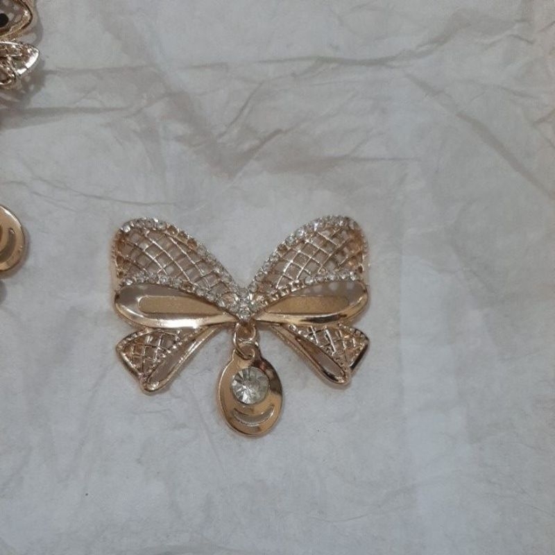 logo tas / hiasan tas