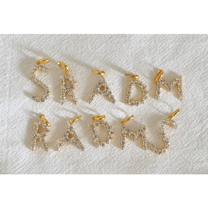 Aksesoris emas muda liontin huruf - 1gr