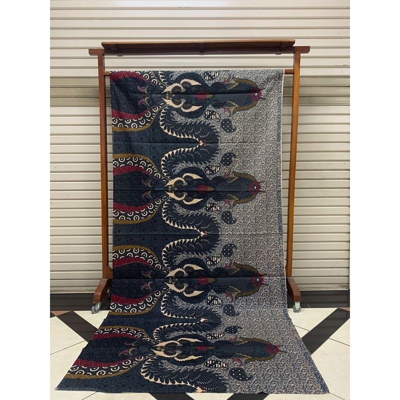 Kain batik solo alusan merak kembar ukelan dongker