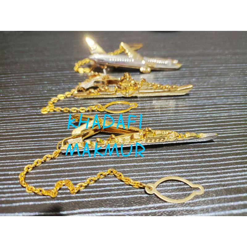 Jepitan dasi perhubungan Udara dan perhubungan laut