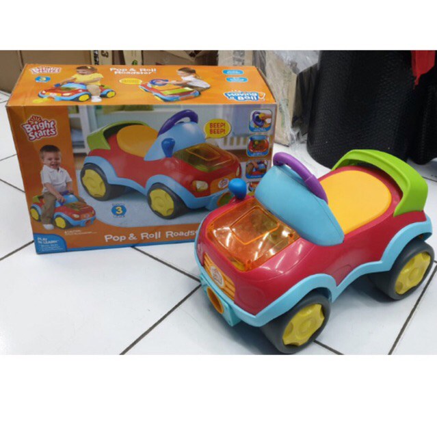 Preloved mobil ride on anak Bright Starts Pop & Roll Roaster