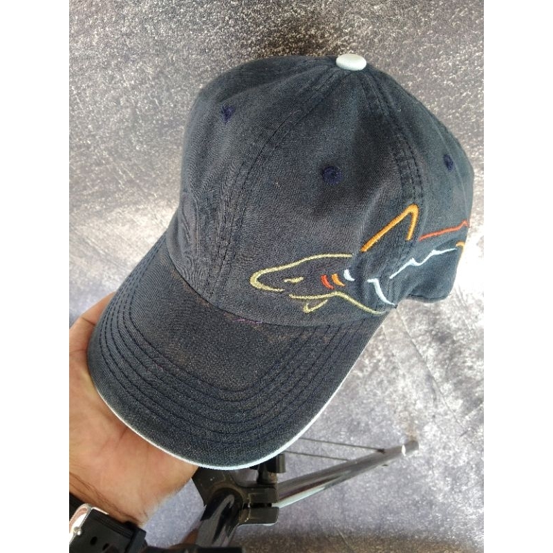 topi greg norman