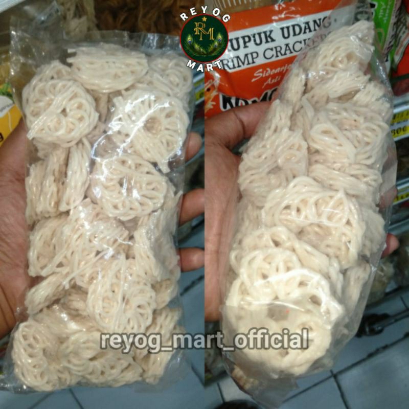 

KERUPUK MENTAH KEMBANG MAWAR PUTIH 300 GRAM SIAP GORENG DAN UNTUK SEBLAK