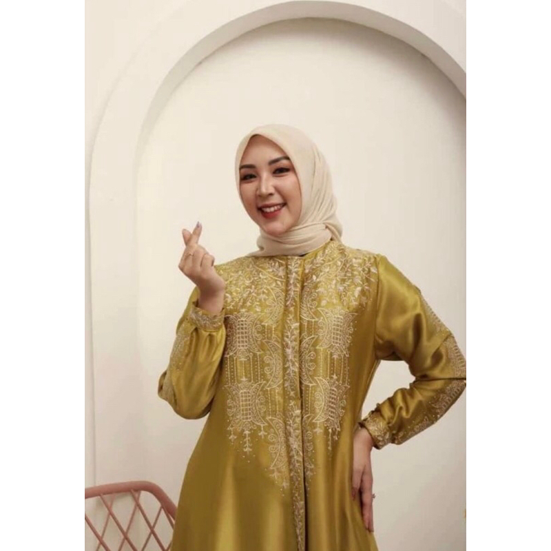 Gamis motif pintu aceh terbaru