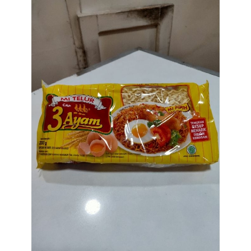 

Mi telur cap tiga ayam