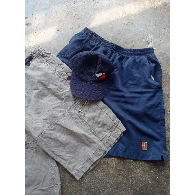 sp nike court dan topi