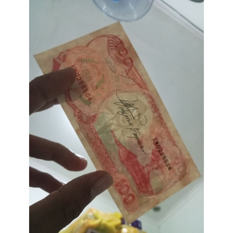 100 rupiah pinisi seri X tandatangan mujirun