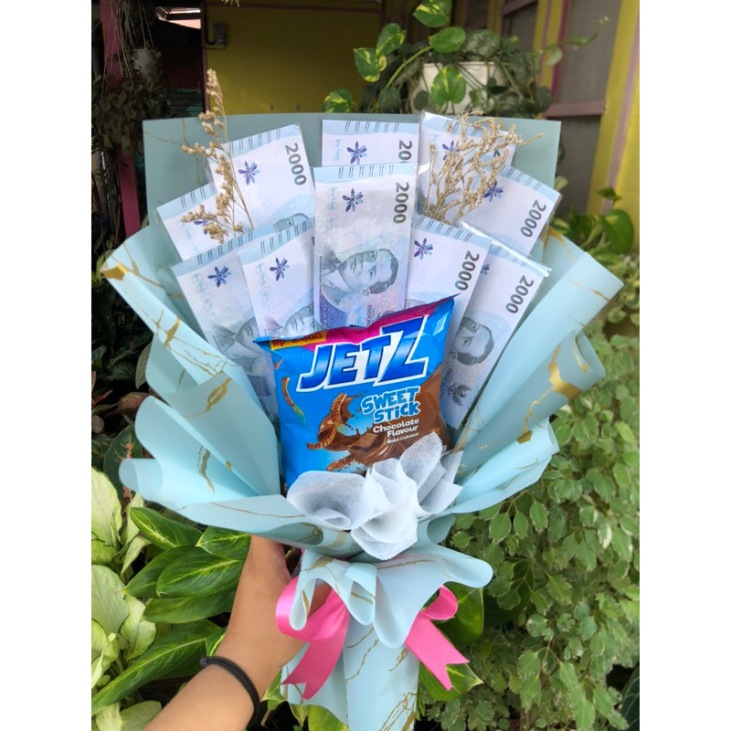 bucket uang 2000 an palsu/asli