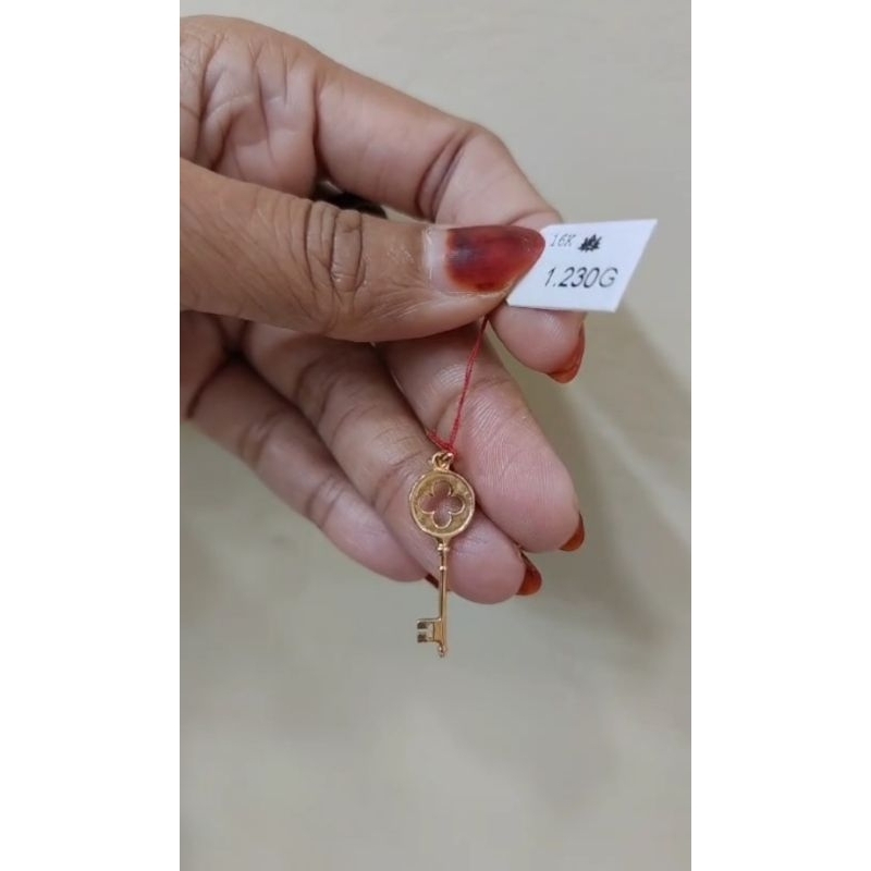 Liontin emas 70 kunci bunga