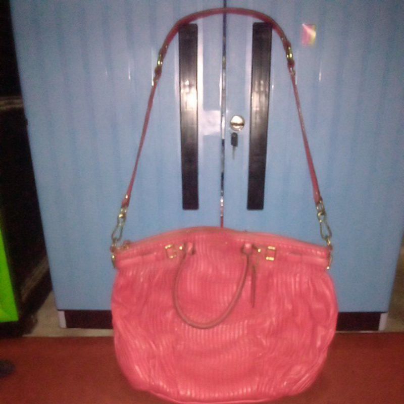 coach Madison warna fusia