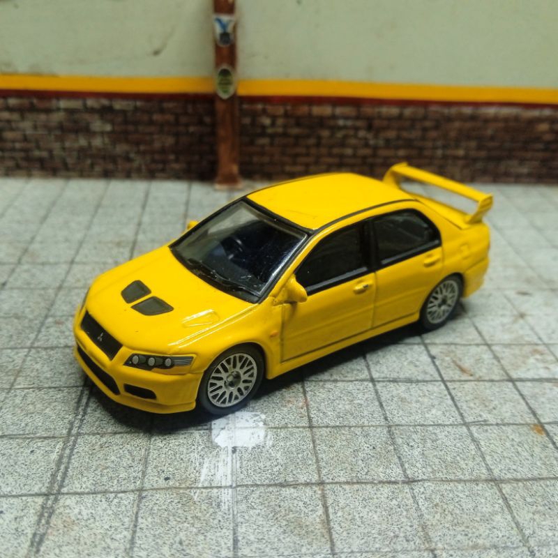 Mobilan mainan anak Autoart skala 64 Mitsubishi Lancer Evo 9 Loose mulus