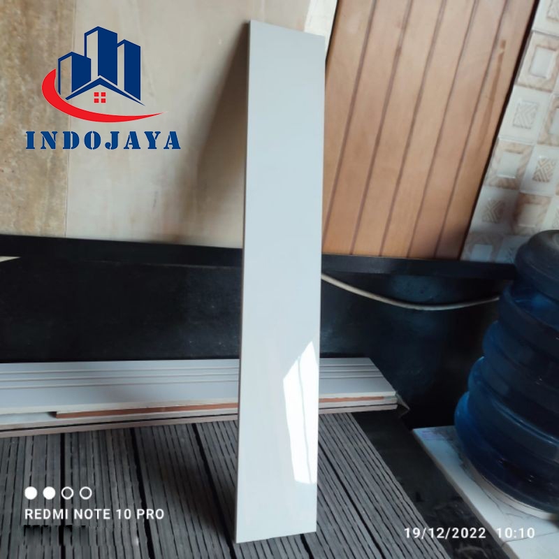 list kramik granit 10x60 lantai dinding putih polos glosy keramik