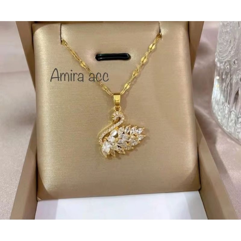 kalung titanium bebek putih permata