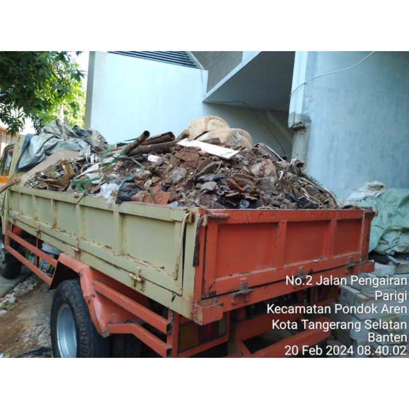 buang puing bangunan