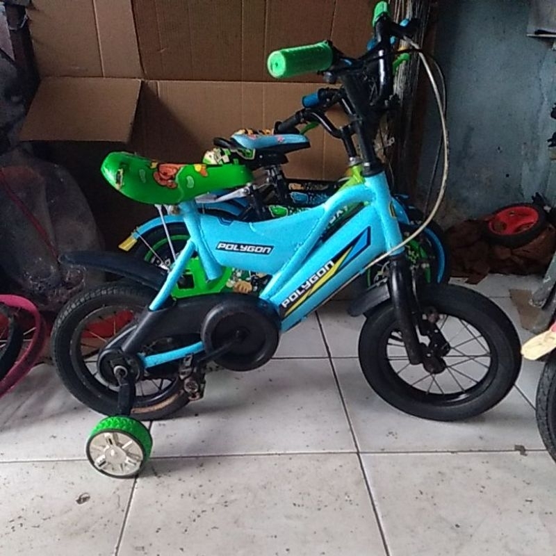 SEPEDA ANAK UKURAN 12IN BEKAS SIAP PAKE