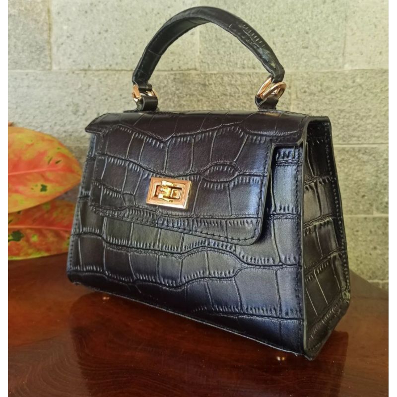 TAS KULIT SAPI EMBOS