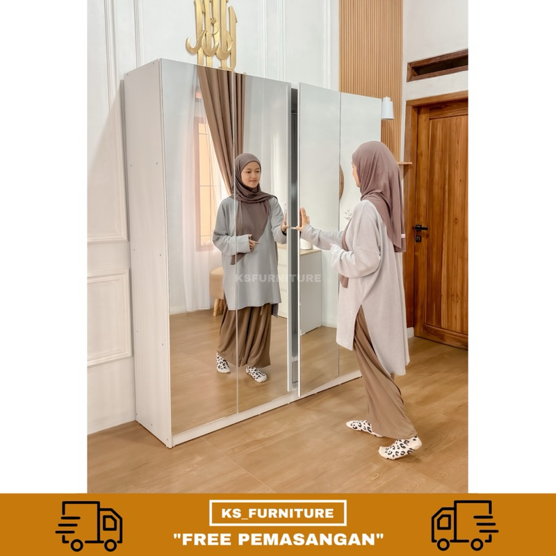 Lemari 4 pintu minimalis full kaca
