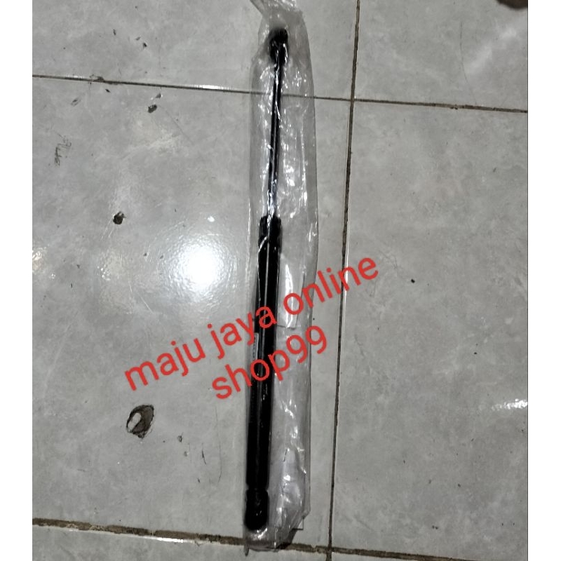 Shock bagasi ignis asli