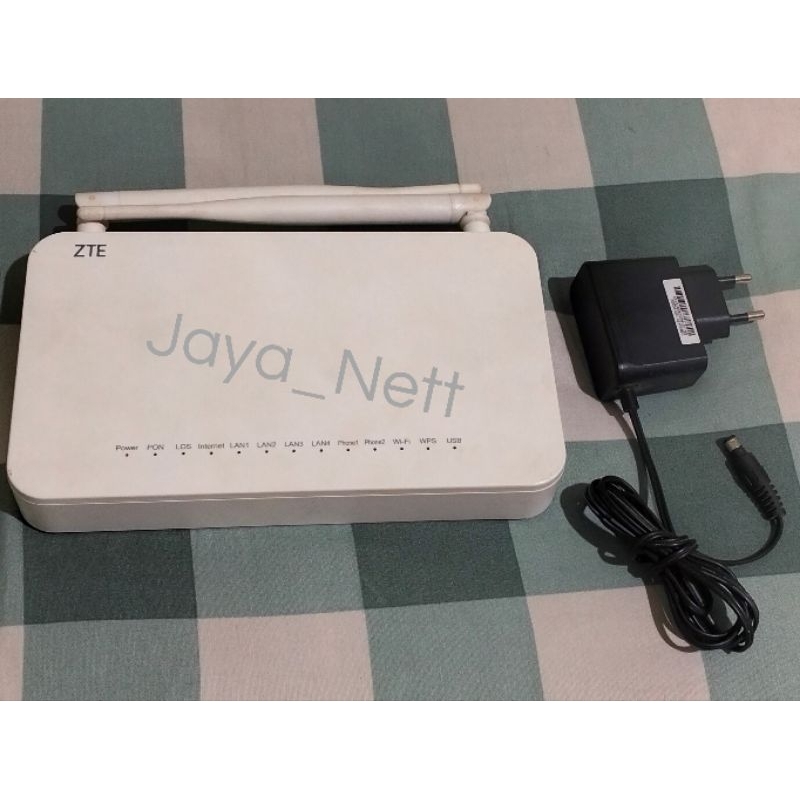 ROUTER/modem  ZTE -F609/V3-UNIT/ADAPTOR/port-biru
