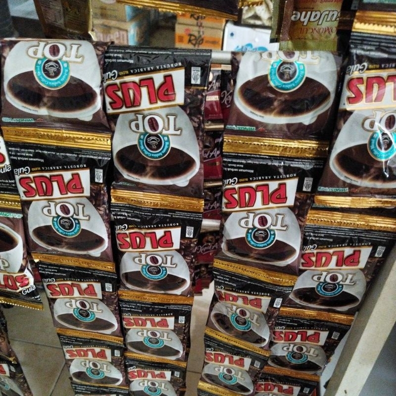 

kopi top plus gula , 10 saset/renteng