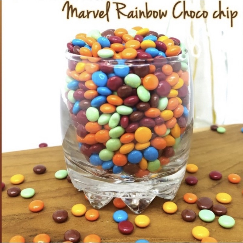 

Choco Chips Rainbow Warna Warni Marvel Scandia bentuk gepeng kemasan 250 gr