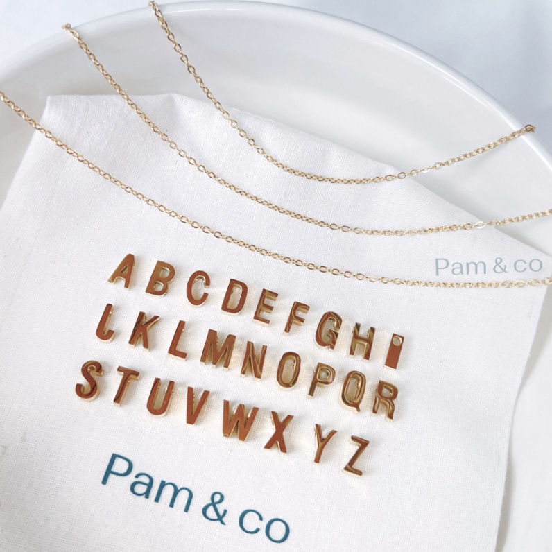 ART D97F Pam  Co  Liontin Huruf Titanium Azy