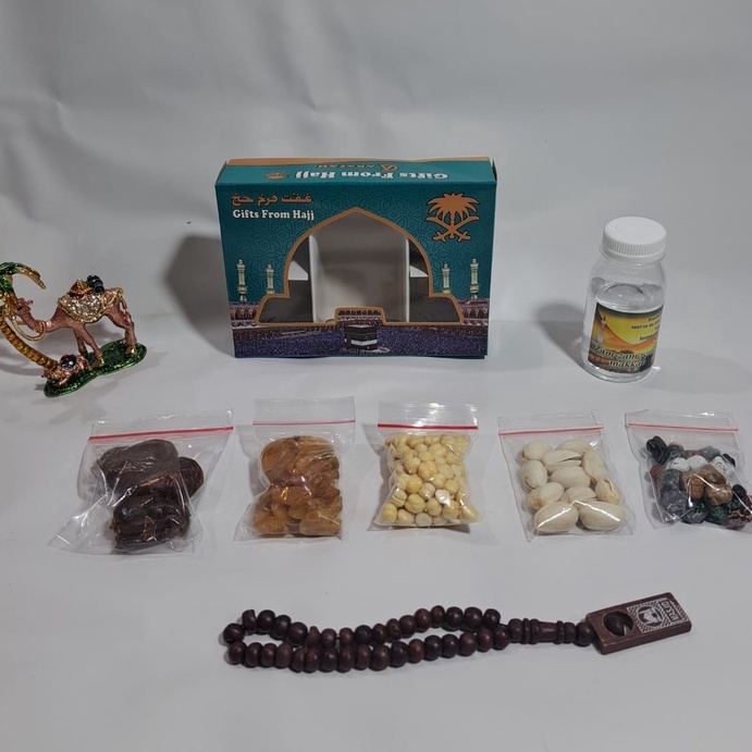 

Kejutan disini PAKET oleholeh haji dan umroh air zamzam ori kacang pistachio coklat kerikil tasbih kayu
